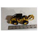Die-Cast Caterpillar 518 Skidder Model