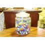 Large jar of old marbles