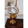 Brass oil lamp with floral decorated shade (has