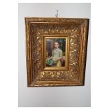 Painting of a girl in an ornate gold frame 12.5 X