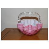 Pink/cranberry art glass basket with thorn handle