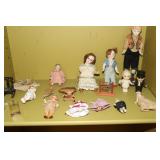 Lot of small porcelain dolls including Kewpie