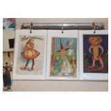 Binder containing old postcards including