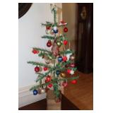 Table top Christmas tree decorated with old