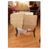 Quilt rack with afghans, table cloth and more