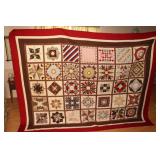 Handmade patchwork quilt with signatures of