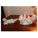 2 Piano babies - one hugging a cat one is made in