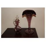 Purple fan style vase with ruffled top and a