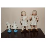Porcelain dancing man and woman on blue base and