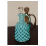 Blue opalescent ribbed cruet with an applied