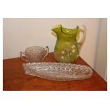 Green floral decorated pitcher with applied