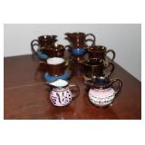 8 Copper Lusterware creamers