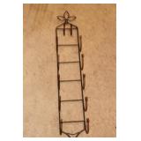 Wrought iron wall towel holder