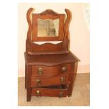 Wooden oak doll dresser (damaged) and 4 doll