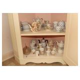 Contents of 2 shelves - teapots (some marked