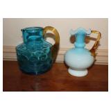 Blue dimpled glass pitcher with amber handle