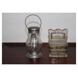 Small glass skaters lantern and a glass dresser
