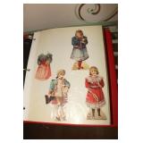 Binder containing paper dolls and advertising