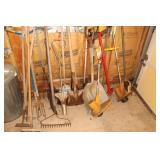 Yard tool lot - rakes, shovels, bush axe, tiller