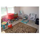 Corner lot of childrens toys and furniture