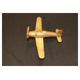 Brass model of a WWII fighter plane and a brass