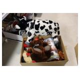 Box of stuffed animals, blanket, stickers and