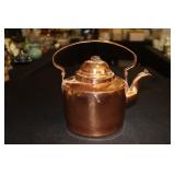 Copper tea kettle with initials on the handle