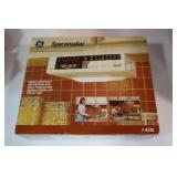 GE Spacemaker am/fm radio with clock in box