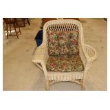 Wicker armchair with magazine pocket