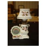 Porcelain oil lamp decorated with flowers and