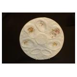 Oyster plate decorated with flowers