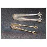 2 Sterling sugar tongs with claw design