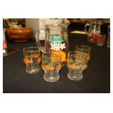 Orange juice pitcher with 4 matching glasses