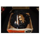 Motion activated witch wreath in box