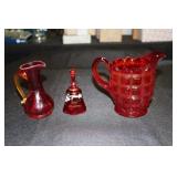 Ruby glass small pitcher, amberina handled vase