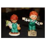 2 Goebel Charlot Byj Collection figurines of red
