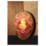 German Easter egg with a chick and violet flowers
