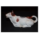 Cow creamer