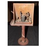 Antique telegraph sounder housed in a resonator