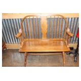 Spindle back bench with wheat pattern design on