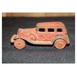 2 piece construction cast iron toy car with clip