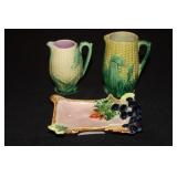 2 Majolica corner pitchers (chips and age cracks)
