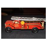 Walt Reach Toy by Courtland tin wind up fire