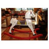 Rich Toys rocking horse on wooden base