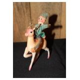 Pixie Elf on plastic reindeer