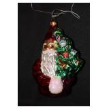 Radko ornament - Santa Claus holding a Christmas