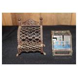 Cast iron cash still bank and a J. Chein tin dime