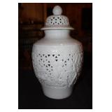 White porcelain reticulated temple jar decorated