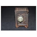 Cast iron still bank with combination door