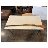 Black powder rifle with octagon barrel and brass